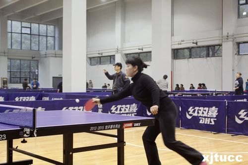 西安交通大學城市學院乒乓球隊在交大2013年教職工乒乓球比賽中再創(chuàng)佳績